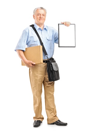 Full length portrait of a delivery person holding a clipboard and box isolated against white backgroundの写真素材
