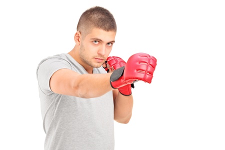 A boxer in action isolated on white backgroundの写真素材