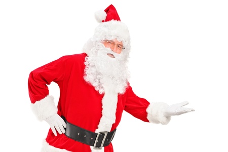 A happy santa claus gesturing isolated on white backgroundの写真素材