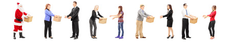Full length portrait of different people collaborating each other, isolated on white background