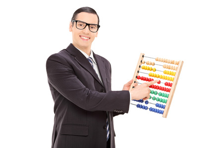 Businessman moving the units of an abacus isolated on white backgroundの写真素材