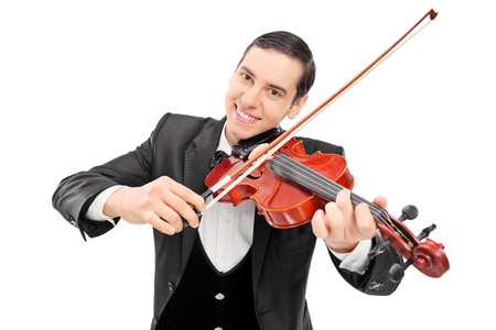 Cheerful young musician playing a violin isolated on white background