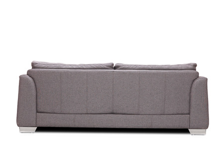 Rear view studio shot of a modern gray sofa isolated on white background