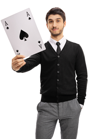 Young man holding an ace of spades card isolated on white backgroundの写真素材