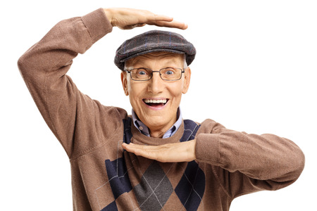 Joyful elderly man making a hand frame isolated on white background