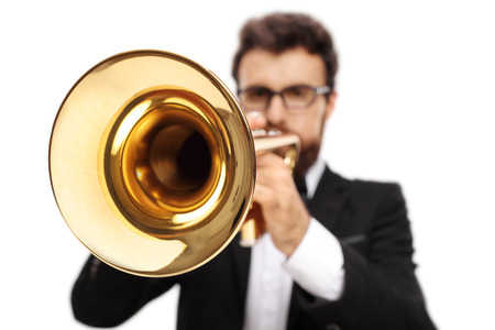 Trumpet player isolated on white background