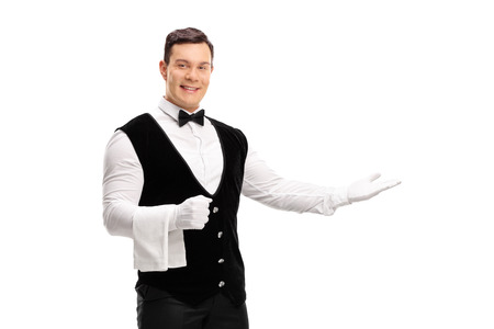 Waiter gesturing with his hand isolated on white background