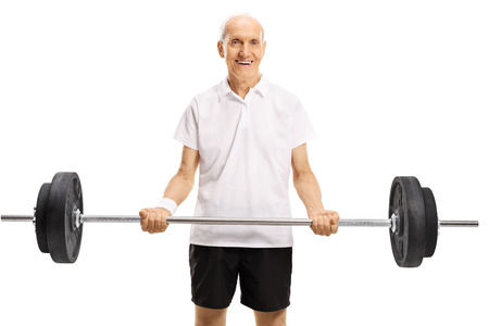 Elderly man lifting a barbell isolated on white backgroundの写真素材