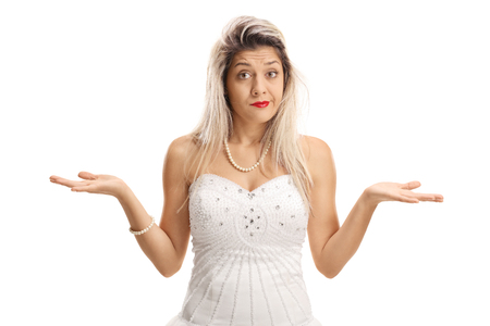 Bride with a messy hair wondering what to do isolated on white backgroundの写真素材