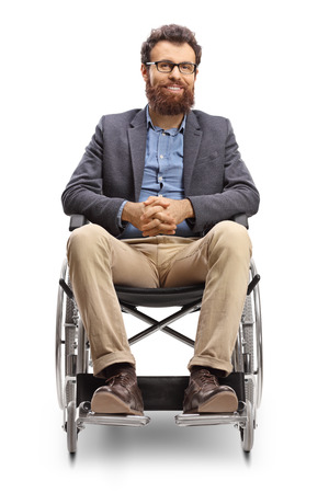 Full length portrait of a young bearded man in a wheechair isolated on white backgroundの写真素材