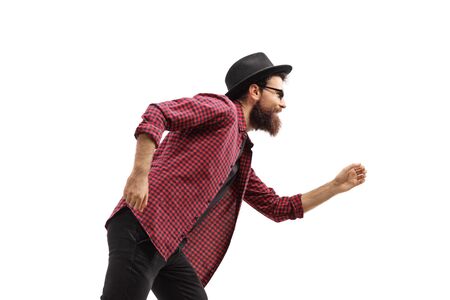 Profile shot of a man dancing isolated on white backgroundの写真素材