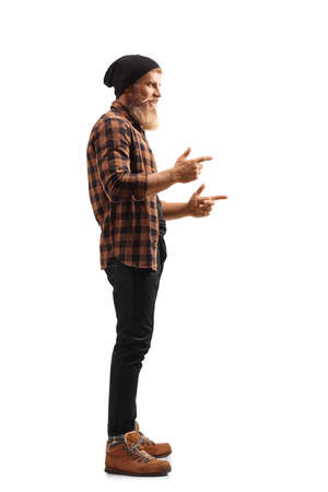 Full length profile shot of a bearded guy standing and gesturing with both hands isolated on white backgroundの写真素材