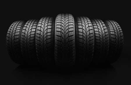 Car tires on black backgroundの写真素材