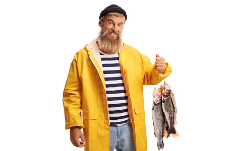 Happy fisherman holding fish on a bait isolated on white background