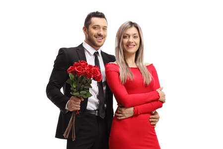 Elegant couple with a bunch of red roses isolated on white background
