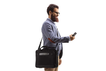 Man typing on a mobile phone and carrying a laptop bag isolated on white background