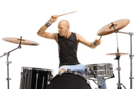 Male performer playing drums isolated on white backgroundの写真素材