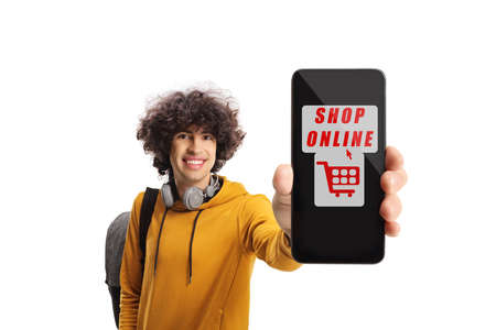 Male student showing a smartphone with text shop online isolated on white backgroundの写真素材