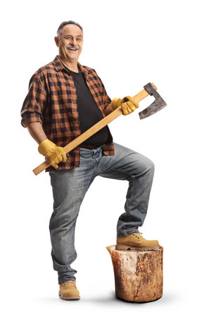 Man with an axe and a tree trunk cut isolated on white backgroundの写真素材