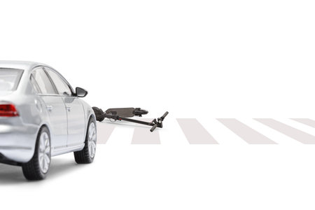 Car accident with an electric scooter on a pedestiran crossing isolated on white backgroundの写真素材