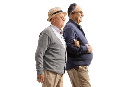 Elderly men walking together isolated on white backgroundの写真素材