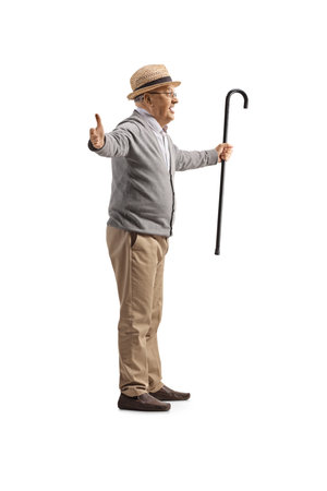 Excited elderly man waiting with arms wide open isolated on white backgroundの写真素材