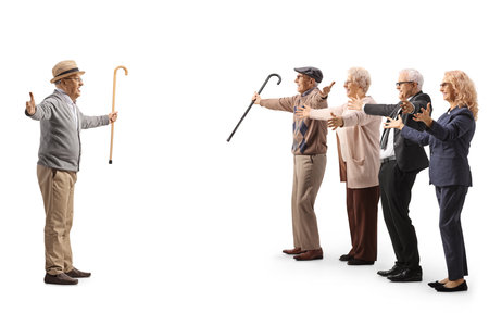 Full length profile shot of an elderly gentleman meeting his family isolated on white backgroundの写真素材
