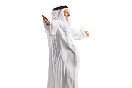 Happy arab man standing with open arms isolated on white backgroundの写真素材