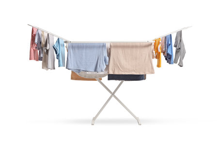 White washing line with clothes hanging isolated on white backgroundの写真素材