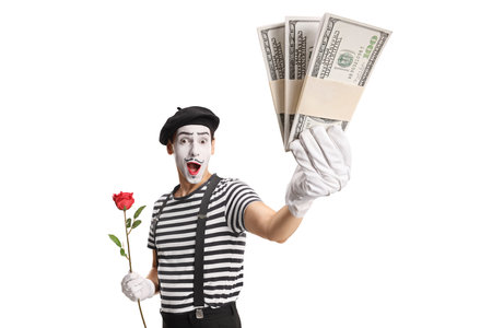 Mime holding a red rose and stacks of money isolated on white backgroundの写真素材