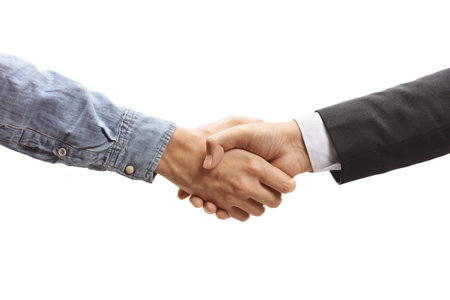 Salesman shaking hands with a customer isolated on white backgroundの写真素材