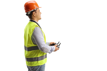 Engineer holding a drone remote controller isolated on white background