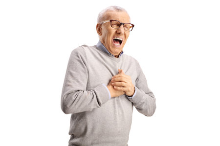 Elderly man experiencing cardiac arrest isolated on white background