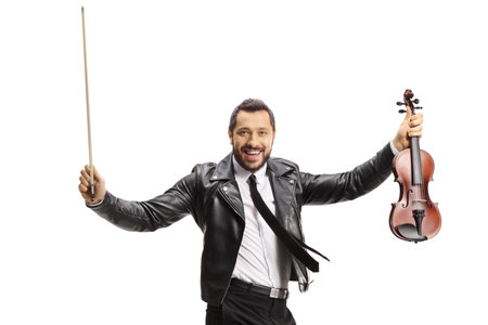 Modern male violinist holding a violin and jumping isolated on white backgroundの写真素材