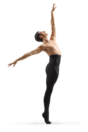 Male ballet dancer in black tights and torso dancing isolated on gray backgroundの写真素材