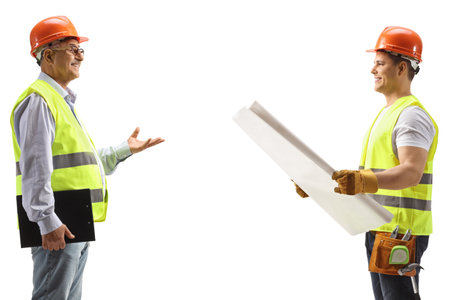 Site engineer talking to a construction worker isolated on white background