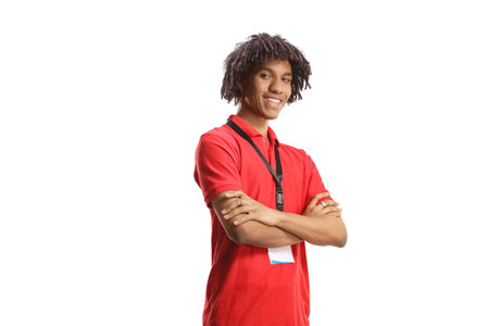 African american shop assistant posing with crossed arms isolated on white backgroundの写真素材