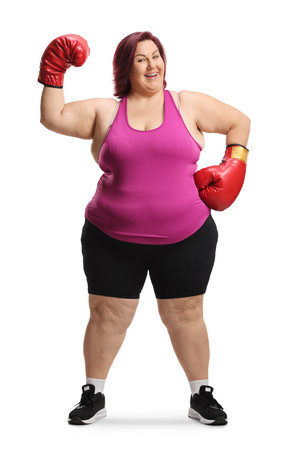 Woman with boxing gloves isolated on white backgroundの写真素材