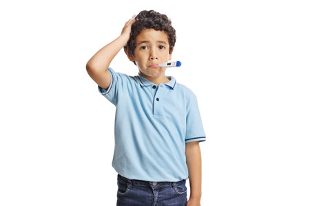 Sad boy with thermometer in mouth isolated on white backgroundの写真素材