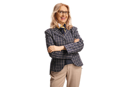 Middle aged woman smiling and posing isolated on white backgroundの写真素材