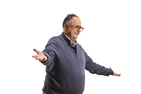 Mature man gesturing with hands isolated on white backgroundの写真素材