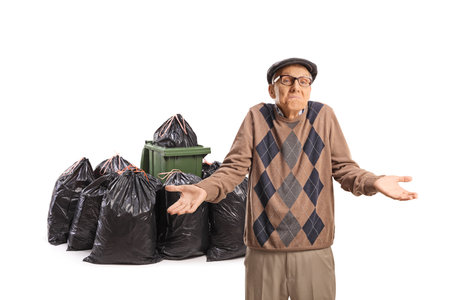 Senior citizen annoyed by the amount of waste isolated on white background