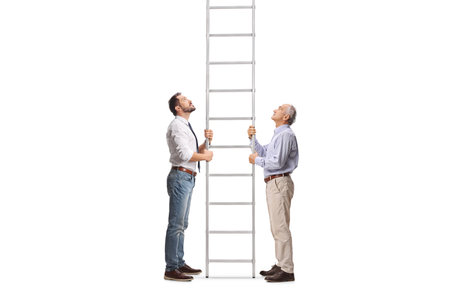 Elderly and young man holding a steel ladder isolated on white backgroundの写真素材