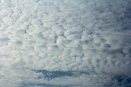 white clouds against blue sky.