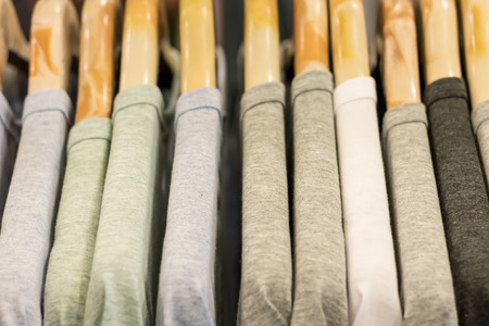 The fashion clothing on hangers at the show in the shop.の写真素材