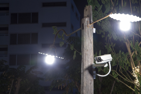 CCTV Camera on pole with under the lamps.