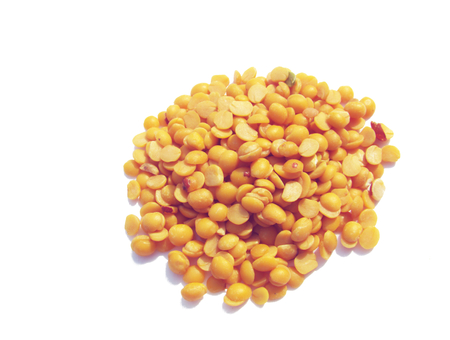 Image of tropical split green pea Cajanus cajan also called toor daal along with the raw peaの写真素材