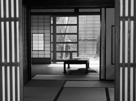 Traditional Japanese living room opening onto an outside space.
の写真素材