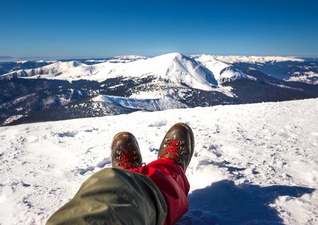 Hiker enjoy nature at sunny day in mountainsの写真素材