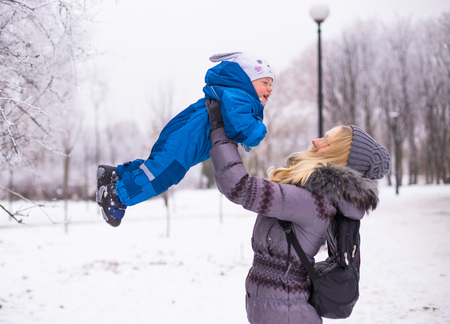 happy family enjoy snow and winter on holidaysの写真素材